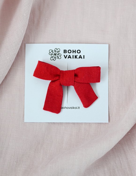 Raudonas, lininis kaspinėlis mergaitei