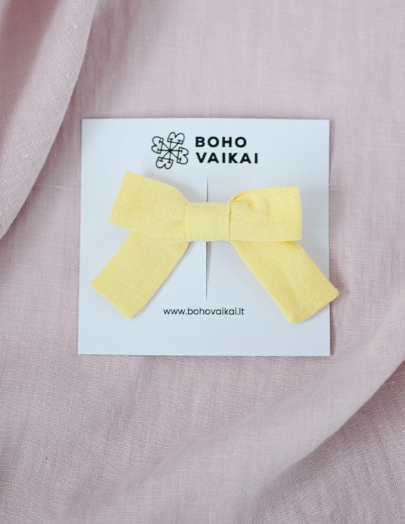 Geltonas, lininis kaspinėlis mergaitei