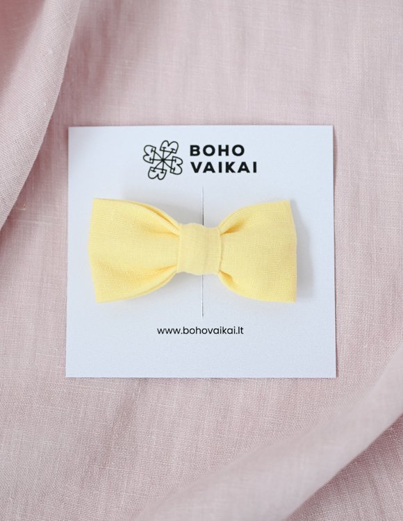 Geltonas, lino kaspinas mergaitei