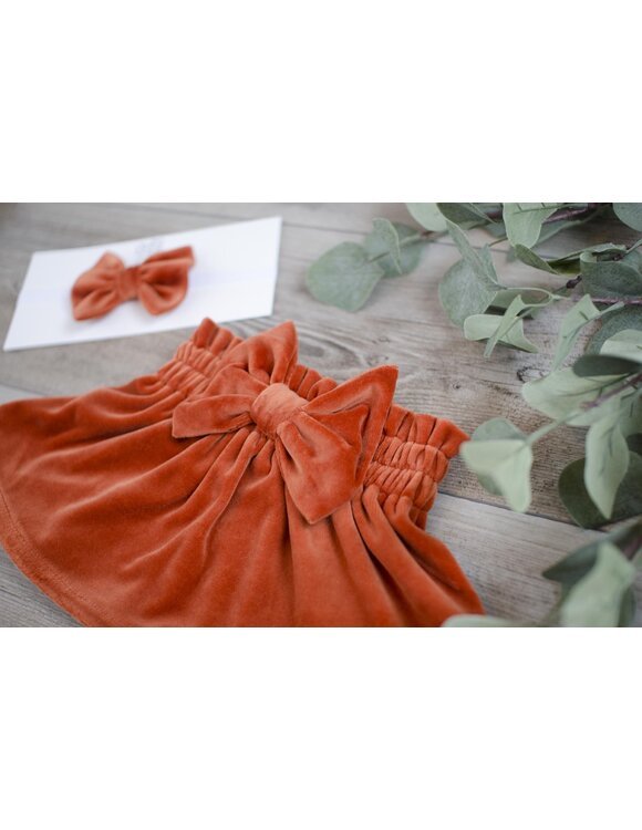 Tamsiai oranžinis, veliūrinis sijonas su kaspinu mergaitei "Medeina" 